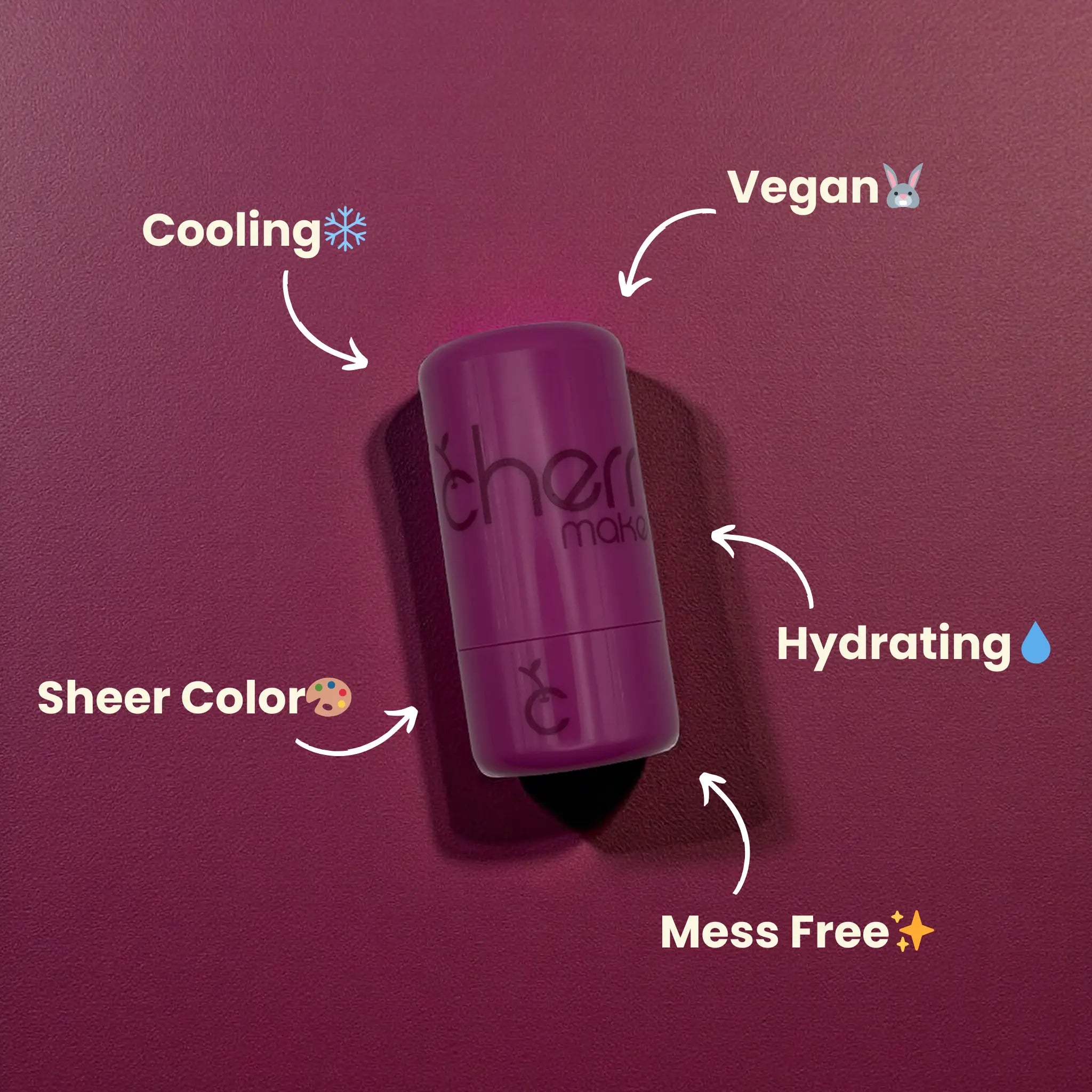 Purple makeup stick with features labeled on a purple background