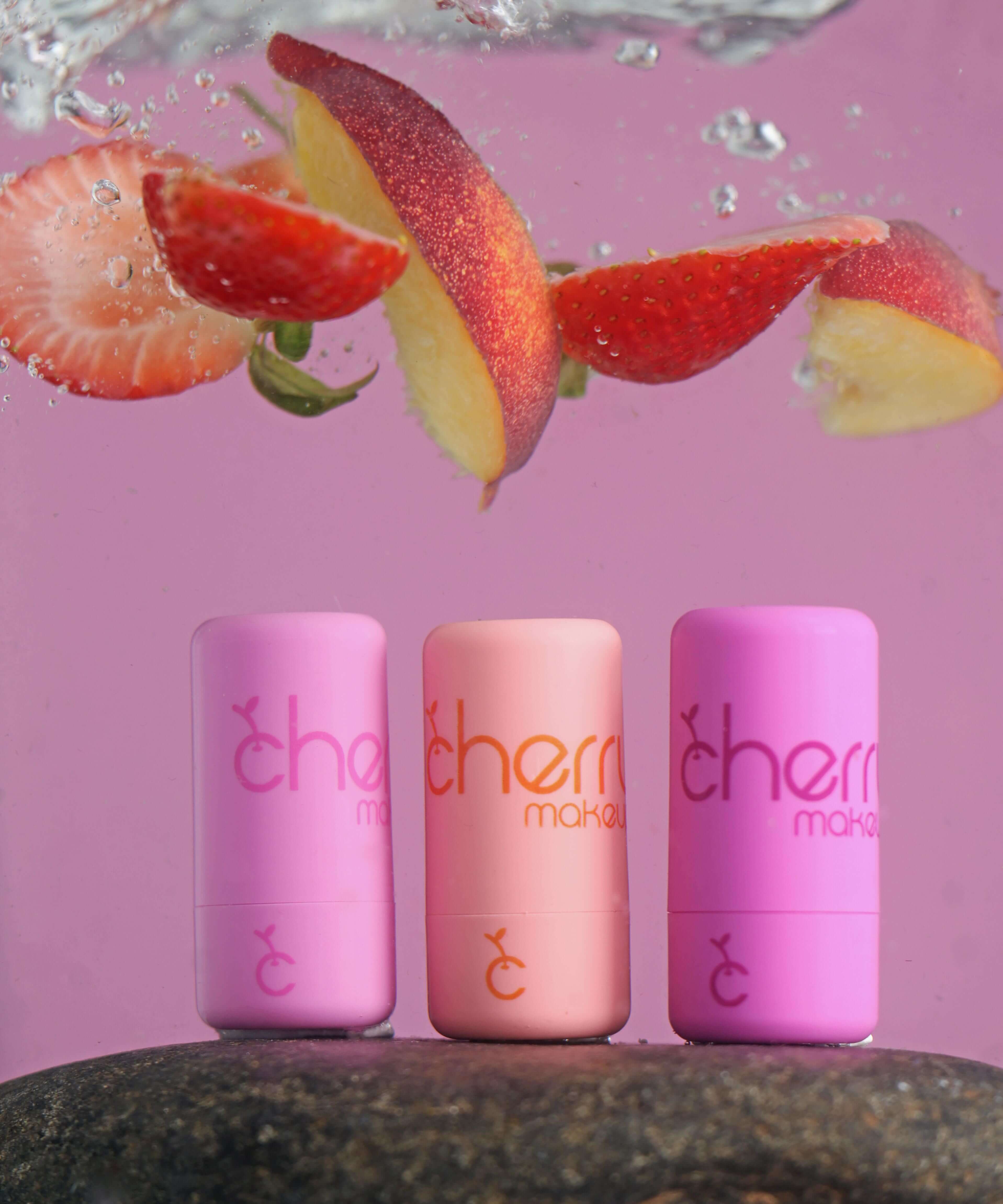 Cherry Makeup Jelly Tints collection on a pink background