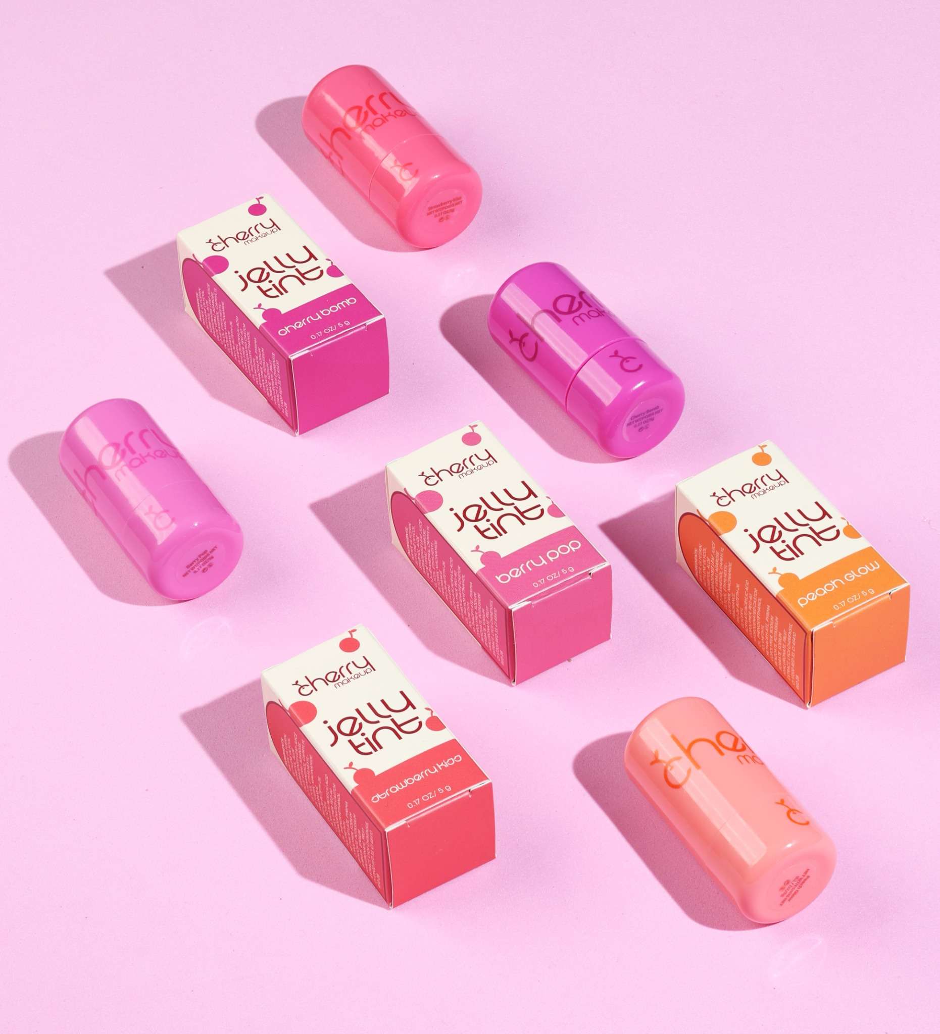 Cherry Makeup Jelly Tints collection on a pink background