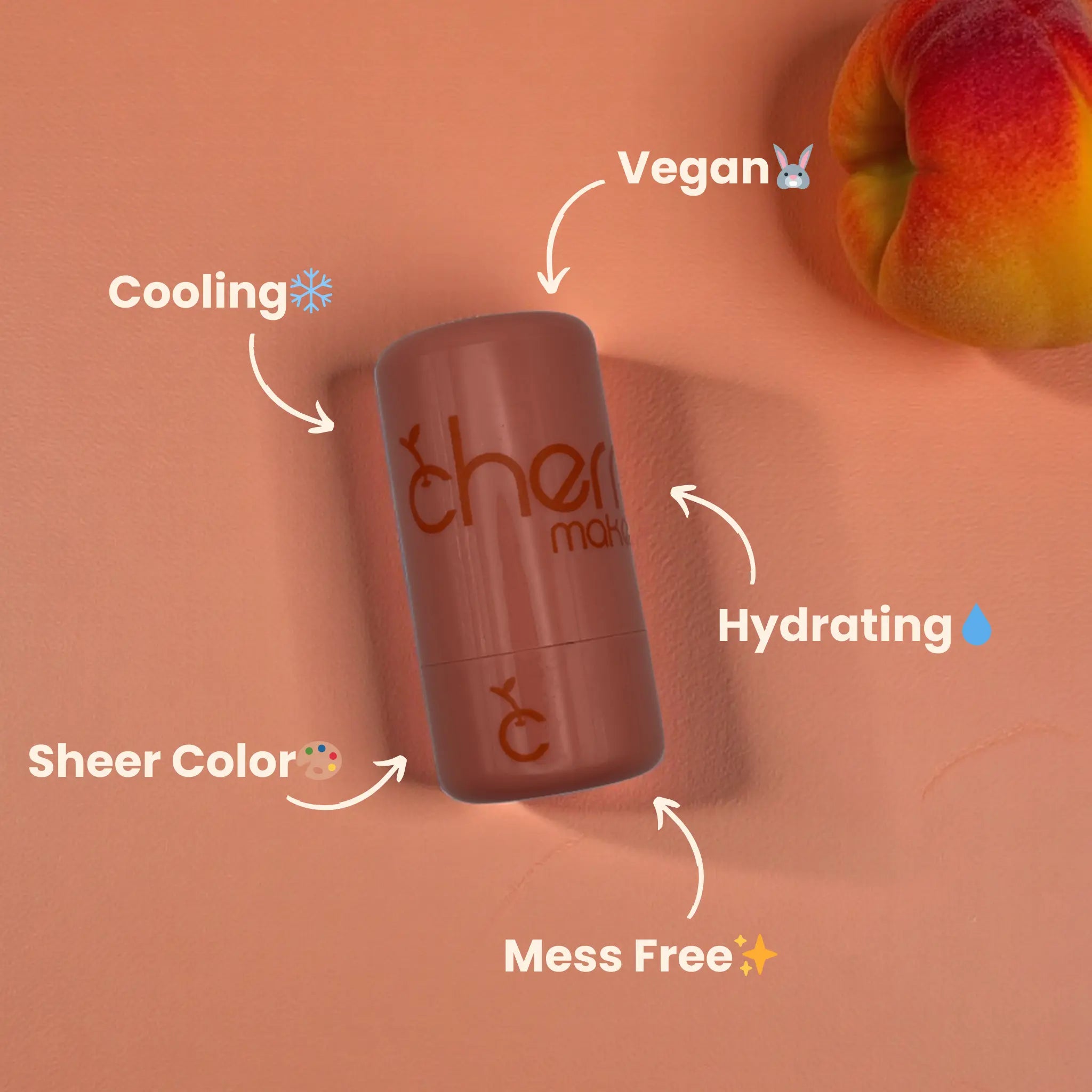Cosmetic stick with text highlighting features on a peach-colored background