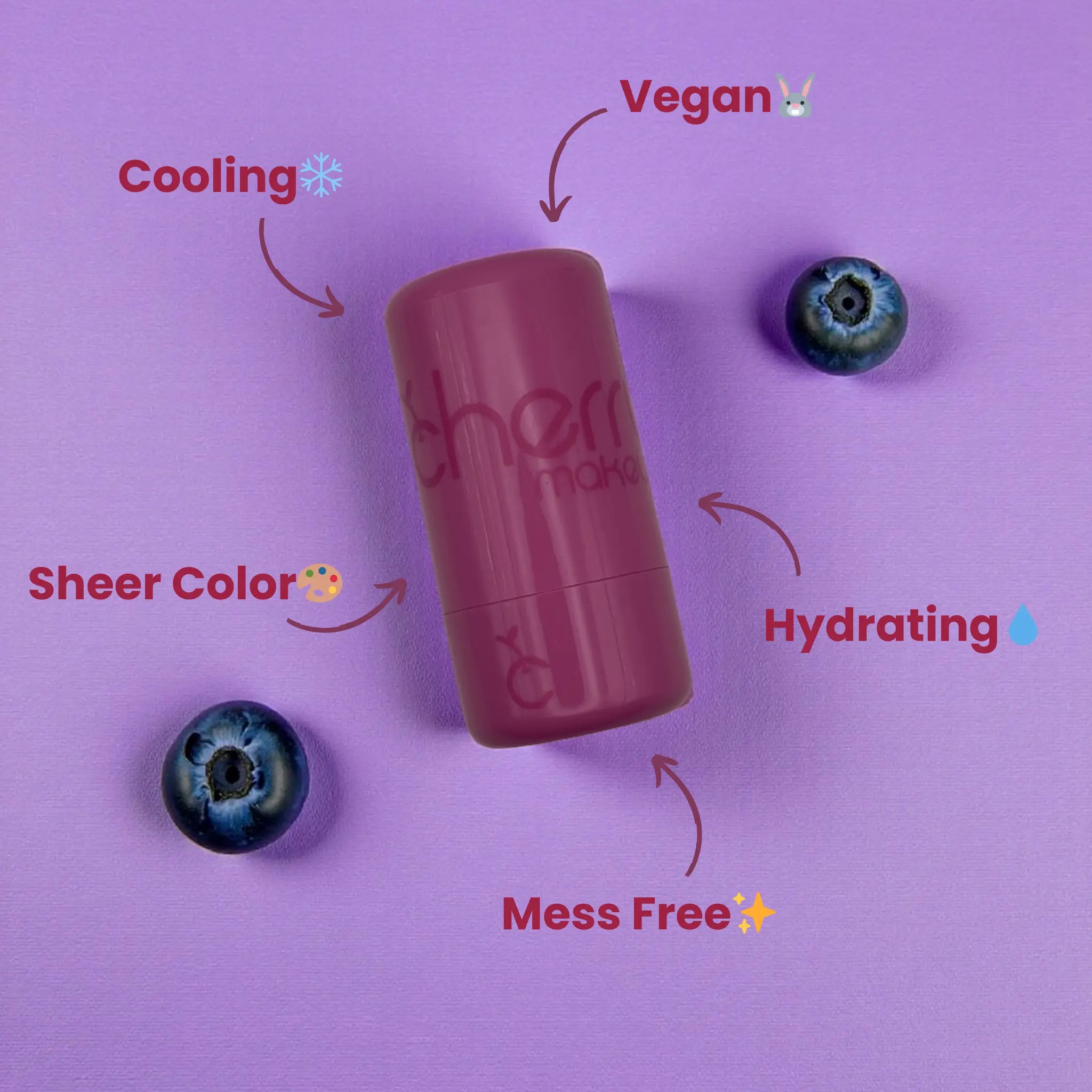 Cherry makeup product with blueberries on a purple background, highlighting features like cooling, vegan, sheer color, hydrating, and mess-free.