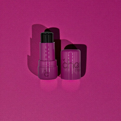 Two purple lip products with 'Cherry Makeup' branding on a pink background